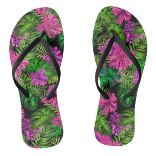 Tropical flowers and plants on black flip flops