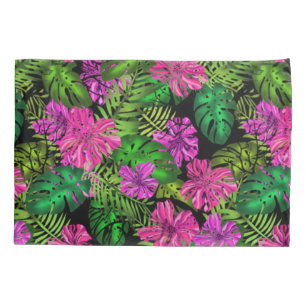 Tropical flowers and plants on black pillowcase