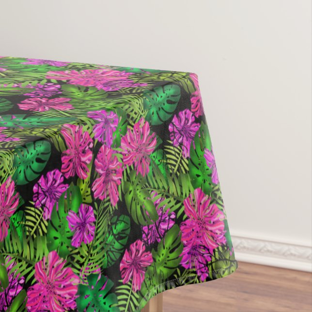 Tropical flowers and plants on black  tablecloth (In Situ)