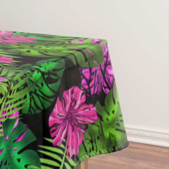 Tropical flowers and plants on black  tablecloth (In Situ)