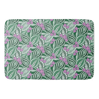 Tropical Green leaves with purple flowers Bath Mat
