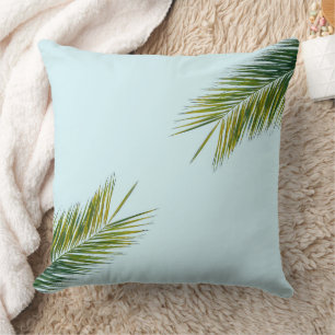 Tropical Green Palm Frond on Light Blue Cushion