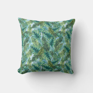 Tropical green plant leaves cushion