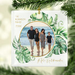 Tropical Hawaiian Mele Kalikimaka Christmas Tree Ceramic Ornament<br><div class="desc">Decorate your christmas tree this year,  with these tropical photo christmas tree ornaments. Featuring a modern tropical greenery leaf frame,  a gold circle,  a family photo,  personalized with your family name and the year. The perfect keepsake or gift for those you love!</div>