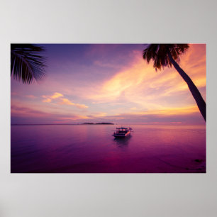 Tropical island in the sunset with a boat poster
