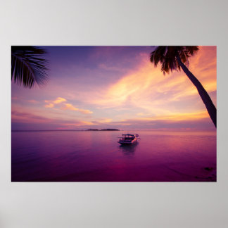 Tropical island in the sunset with a boat poster