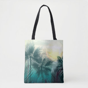 Tropical jungle landscape with palm trees and leaf tote bag