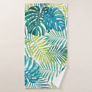 Tropical leaf design featuring green/blue palm and bath towel