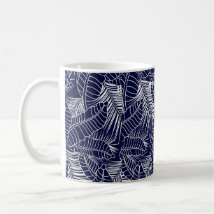 tropical leaf pattern on the navy blue background coffee mug