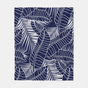 tropical leaf pattern on the navy blue background fleece blanket