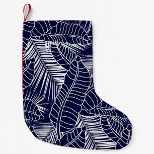 tropical leaf pattern on the navy blue background small christmas stocking