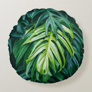 Tropical leaves: dark nature background. round cushion