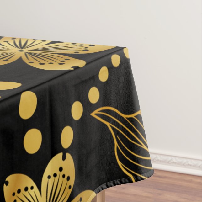 tropical leaves & flowers pattern in gold on black tablecloth (In Situ)