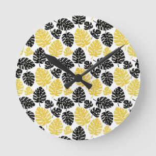 Tropical leaves in Gold and Black Round Clock