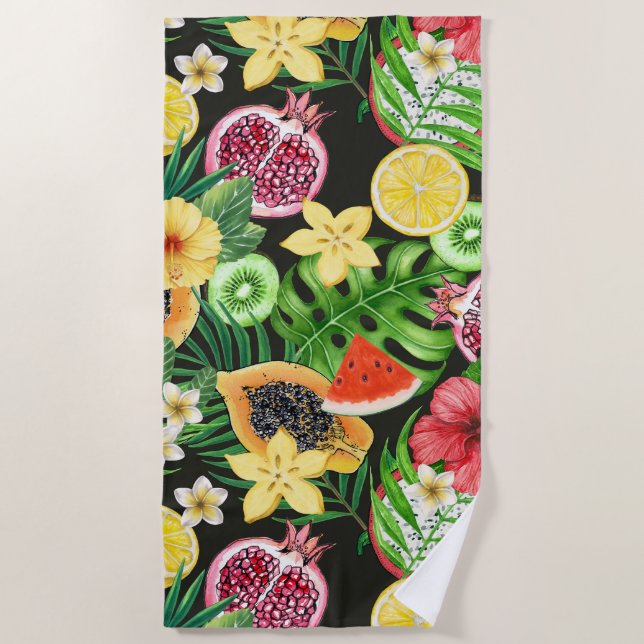 Tropical mix-fruit, flowers and leaves on black beach towel (Front)