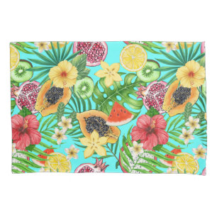 Tropical mix-fruit, flowers and leaves on blue pillowcase