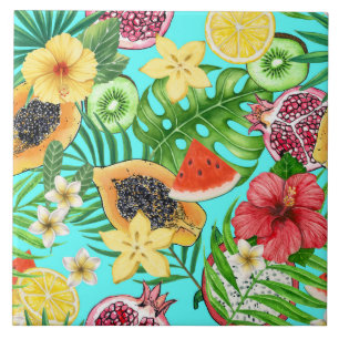 Tropical mix-fruit, flowers and leaves on blue tile