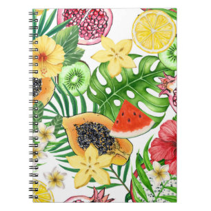 Tropical mix-fruit, flowers and leaves on white notebook