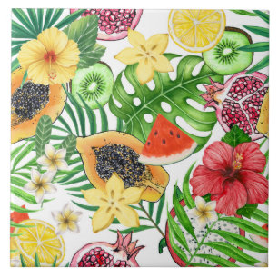 Tropical mix-fruit, flowers and leaves on white tile
