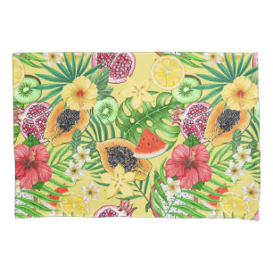 Tropical mix-fruit, flowers and leaves on yellow pillowcase