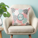 Tropical Monogram Cushion<br><div class="desc">This modern monstera leaf print, graced with soothing pinks, teal (almost a seafoam green), white, and grey, invites a sense of tranquillity and contemporary elegance. This pattern serves as a stylish and versatile addition to your life. Customise the monogram and name to your own (you can use first or last)....</div>