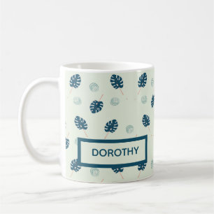 Tropical monstera leaves monogram on blue coffee mug