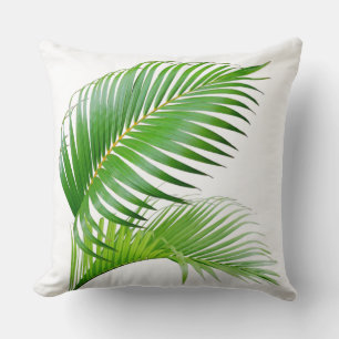 Tropical palm green leaves on white throw pillow