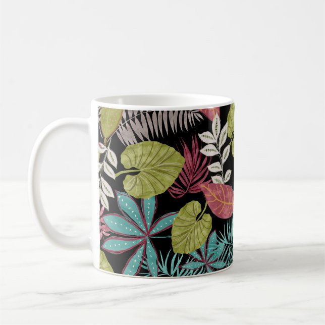 Tropical pattern made with dark background and lea coffee mug (Left)