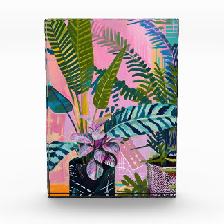 Tropical pink flamingos set against lush green photo block