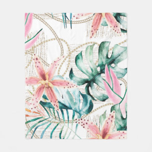 Tropical seamless pattern with orchids leaves and fleece blanket