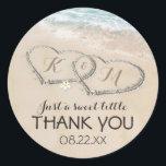 Tropical Vintage Beach Heart Shore Wedding Favour Classic Round Sticker<br><div class="desc">Beach destination wedding favour stickers featuring a summer tropical beach island background, a vintage sandy beach with two hearts in the shoreline, your initials and a editable text template. Click on the “Customise it” button for further personalisation of this template. You will be able to modify all text, including the...</div>