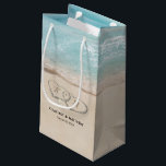 Tropical Vintage Beach Heart Shore Wedding Small Gift Bag<br><div class="desc">Beach destination wedding gift bags featuring a summer tropical beach island background, a vintage sandy beach with two hearts in the shoreline, your initials, name, and wedding date. Click on the “Customise it” button for further personalisation of this template. You will be able to modify all text, including the style,...</div>