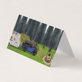 Truck with a Pull Camper in the Woods Cleared Camp