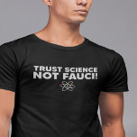 TRUST SCIENCE NOT FAUCI! T-Shirt<br><div class="desc">The design for this TRUST SCIENCE NOT FAUCI t shirt is comprised of a graphic of an atom that is surrounded by a text.</div>