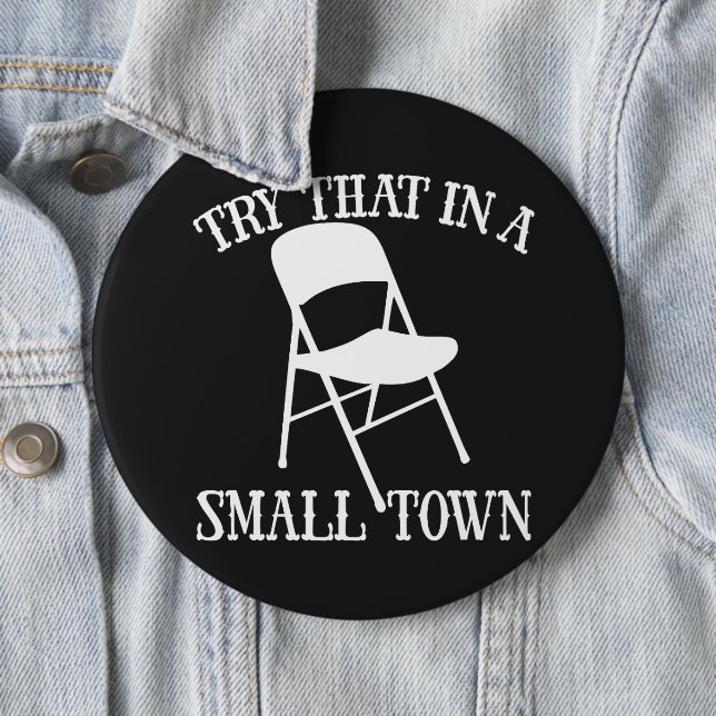Try that in a small town folding chair 6 cm round badge (In Situ)
