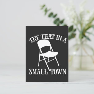 Try that in a small town folding chair postcard