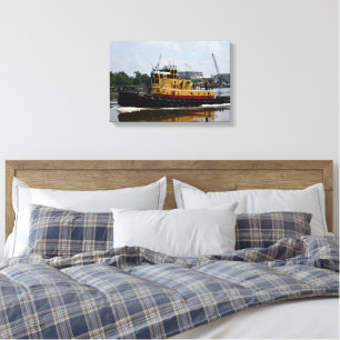 Tugboat working at the river canvas print