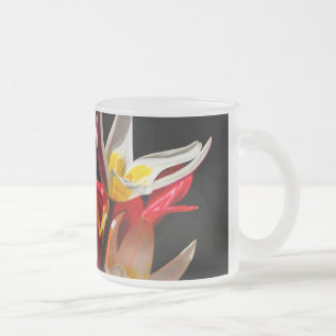 Tulip flowers against black background frosted glass coffee mug