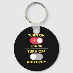 Turn on skiing turn off negativity snow slopes key ring