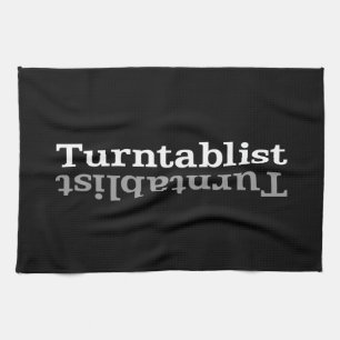 Turntablist ʇsılqɐʇuɹn⊥ tea towel