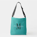 Turquoise blue custom monogram cross body bag<br><div class="desc">Aqua / Turquoise blue custom monogram cross body bag for men and women. Stylish monogrammed design with script typograpgy for personalised name. Add your own custom initial letter. Cool crossbody bags for business, company, school books, paper work, office supplies, sports accessories etc. Great for students, teacher, nurse, employee, co coworker,...</div>