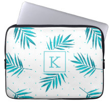 Turquoise-blue tropical leaves pattern