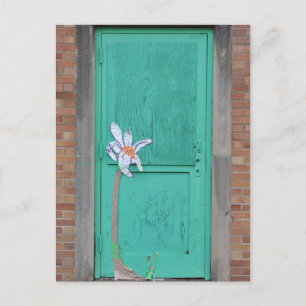 Turquoise door with paper flower postcard