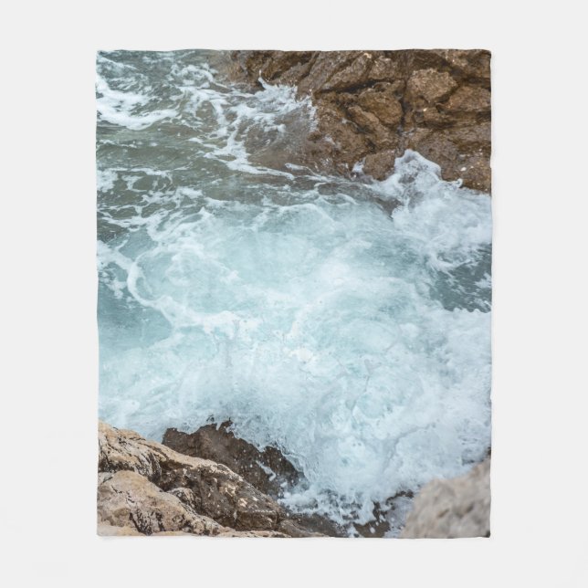 Turquoise Ocean Waves on Rocky Shore Fleece Blanket (Front)