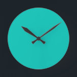 Turquoise Round Clock<br><div class="desc">Turquoise solid color Wall Clock by Gerson Ramos.</div>