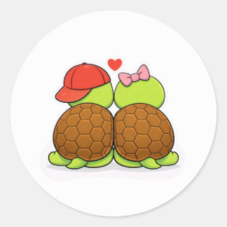 Turtles sharing a moment of joy classic round sticker