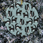 Tuxedo Black and White Cats Ceramic Tree Decoration<br><div class="desc">Cute black and white tuxedo cats going about their business. A fun pattern on a mid blue background.</div>