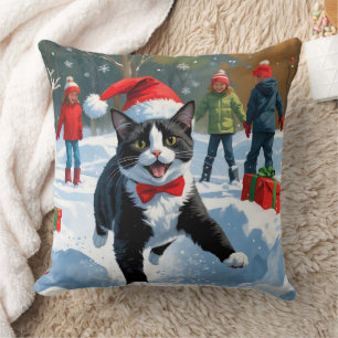 Tuxedo Cat Running in Snow with Christmas Hat Cushion