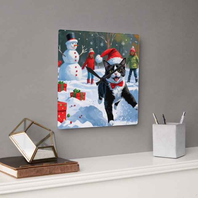 Tuxedo Cat Running in Snow with Christmas Hat Square Wall Clock (Office)