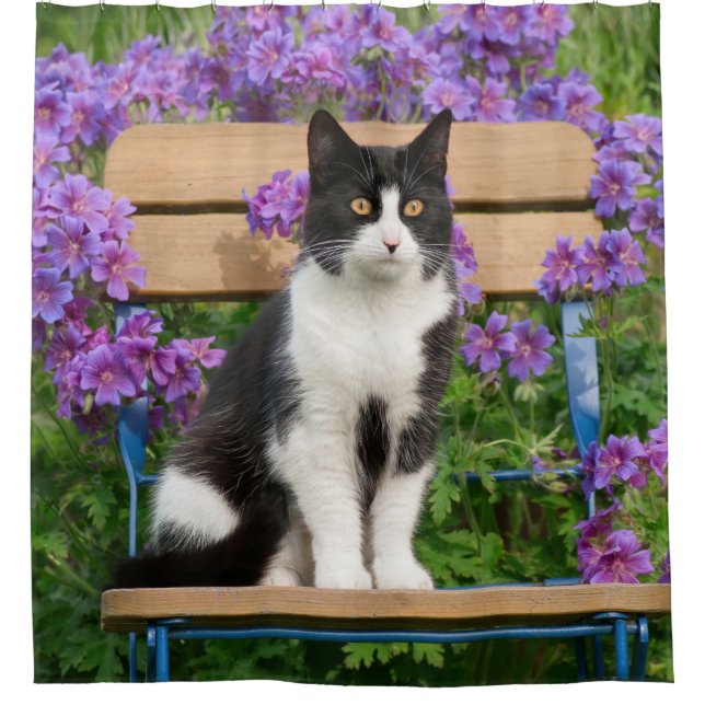 Tuxedo cat sitting on a garden chair with flowers shower curtain (Front)